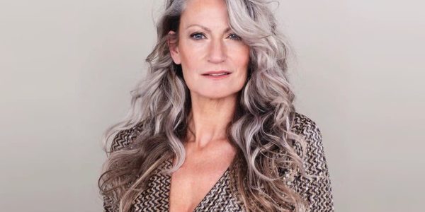 A Woman Smiling For The Camera