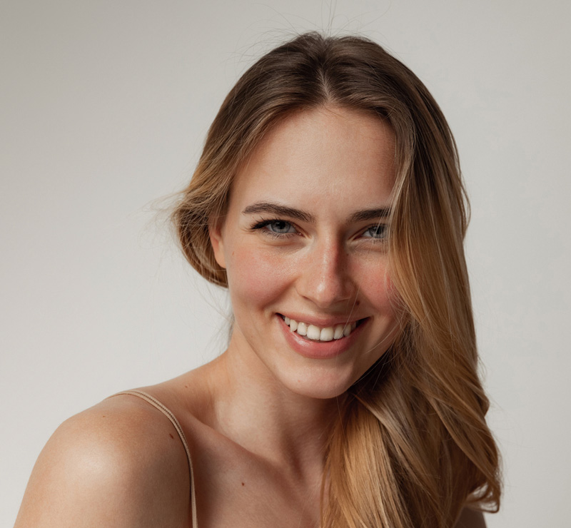 a woman smiling for the camera