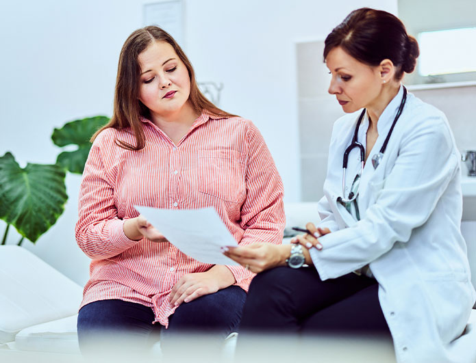 a woman in a white shirt