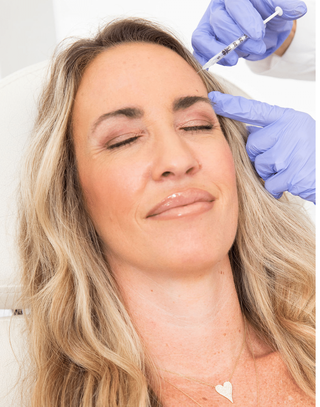 a woman smiling for the camera